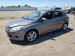 Salvage cars for sale from Copart Bakersfield, CA: 2013 Ford Focus SE