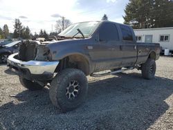 Salvage trucks for sale at Graham, WA auction: 2002 Ford F350 SRW Super Duty