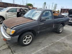 Salvage cars for sale from Copart Wilmington, CA: 1999 Toyota Tacoma