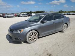 Salvage cars for sale from Copart West Palm Beach, FL: 2013 Volkswagen Jetta SE