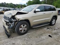 Salvage SUVs for sale at auction: 2012 Jeep Grand Cherokee Laredo