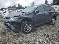 Salvage cars for sale from Copart Graham, WA: 2018 Toyota Rav4 HV LE