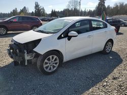 Salvage cars for sale at auction: 2016 KIA Rio EX