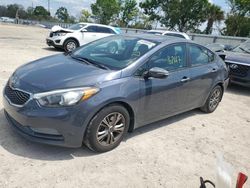 Salvage cars for sale from Copart Riverview, FL: 2015 KIA Forte LX