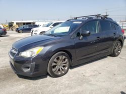 Salvage cars for sale from Copart Sun Valley, CA: 2012 Subaru Impreza Sport Premium