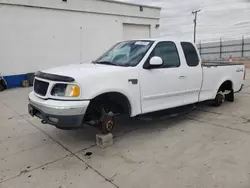 Salvage trucks for sale at Farr West, UT auction: 2001 Ford F150