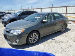 Flood-damaged cars for sale at auction: 2014 Toyota Camry L