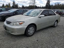Salvage cars for sale from Copart Graham, WA: 2002 Toyota Camry LE