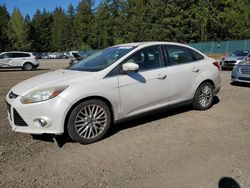 Salvage cars for sale from Copart Graham, WA: 2012 Ford Focus SEL