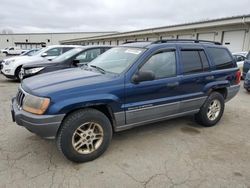 Salvage SUVs for sale at auction: 2002 Jeep Grand Cherokee Laredo
