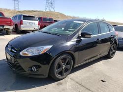 Salvage cars for sale at Littleton, CO auction: 2012 Ford Focus Titanium