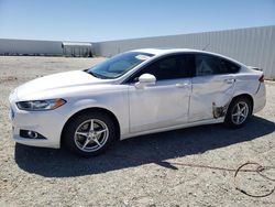 Salvage cars for sale from Copart Adelanto, CA: 2016 Ford Fusion SE