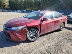 Salvage cars for sale from Copart Graham, WA: 2016 Toyota Camry Hybrid