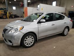 Salvage cars for sale from Copart Blaine, MN: 2013 Nissan Versa S
