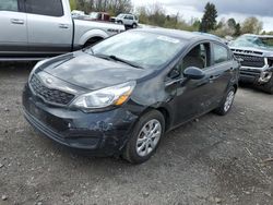 Salvage cars for sale at auction: 2015 KIA Rio LX