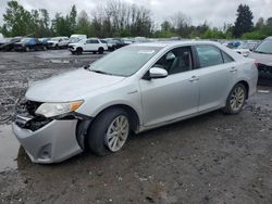 Salvage cars for sale from Copart Portland, OR: 2012 Toyota Camry Hybrid