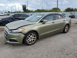 Salvage cars for sale at Miami, FL auction: 2013 Ford Fusion SE