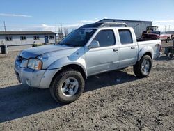 Salvage cars for sale from Copart Airway Heights, WA: 2001 Nissan Frontier Crew Cab XE