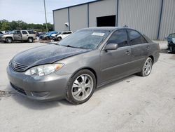 Salvage cars for sale at Apopka, FL auction: 2005 Toyota Camry LE