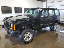 Salvage cars for sale from Copart Blaine, MN: 1999 Jeep Cherokee Sport