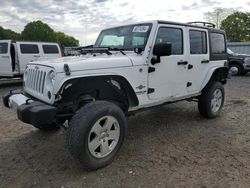 Jeep salvage cars for sale: 2012 Jeep Wrangler Unlimited Sport
