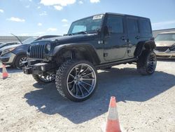 Salvage cars for sale from Copart Arcadia, FL: 2012 Jeep Wrangler Unlimited Sahara