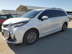 Salvage cars for sale at Fresno, CA auction: 2021 Toyota Sienna XLE