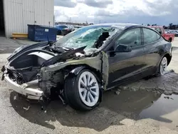 Salvage cars for sale at Sun Valley, CA auction: 2023 Tesla Model 3