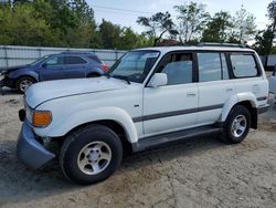 Salvage cars for sale from Copart Hampton, VA: 1997 Toyota Land Cruiser HJ85