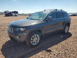 Salvage cars for sale from Copart Phoenix, AZ: 2015 Jeep Grand Cherokee Laredo