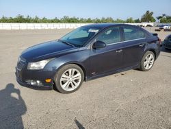 Salvage cars for sale from Copart Fresno, CA: 2014 Chevrolet Cruze LTZ