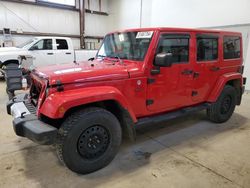 Salvage cars for sale at Nisku, AB auction: 2014 Jeep Wrangler Unlimited Sahara