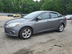 Salvage cars for sale from Copart Austell, GA: 2013 Ford Focus SE