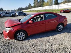 Salvage cars for sale from Copart Graham, WA: 2015 Toyota Corolla L