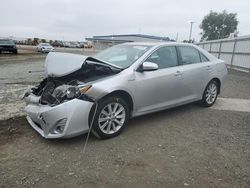 Salvage cars for sale from Copart San Diego, CA: 2012 Toyota Camry Hybrid