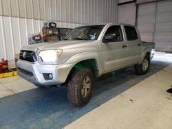 Salvage trucks for sale at Grenada, MS auction: 2013 Toyota Tacoma Double Cab