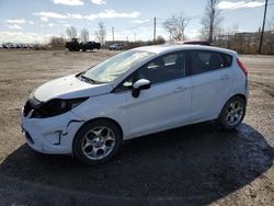 Salvage cars for sale from Copart Montreal Est, QC: 2011 Ford Fiesta SES