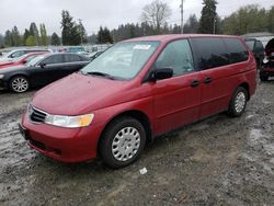 Salvage cars for sale from Copart Graham, WA: 2003 Honda Odyssey LX