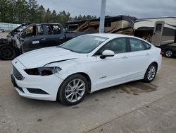 Salvage cars for sale from Copart Eldridge, IA: 2017 Ford Fusion SE Hybrid
