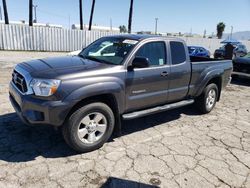 Salvage cars for sale from Copart Van Nuys, CA: 2014 Toyota Tacoma Prerunner Access Cab