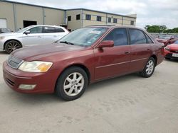 Salvage cars for sale from Copart Wilmer, TX: 2002 Toyota Avalon XL