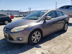 Salvage cars for sale from Copart Sun Valley, CA: 2012 Ford Focus SEL