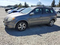 Salvage cars for sale from Copart Graham, WA: 2005 Pontiac Vibe
