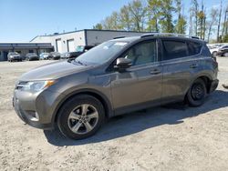 Salvage cars for sale from Copart Arlington, WA: 2015 Toyota Rav4 XLE