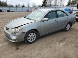 Salvage cars for sale from Copart Bowmanville, ON: 2005 Toyota Camry LE