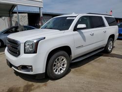 Salvage cars for sale from Copart Fresno, CA: 2016 GMC Yukon XL K1500 SLT