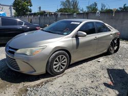 Salvage cars for sale from Copart Opa Locka, FL: 2015 Toyota Camry LE