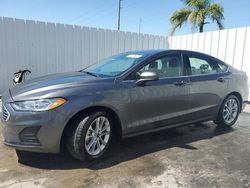 Salvage cars for sale from Copart Riverview, FL: 2020 Ford Fusion SE