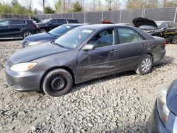 Toyota salvage cars for sale: 2004 Toyota Camry LE