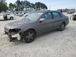 Salvage cars for sale from Copart Loganville, GA: 2003 Toyota Avalon XL